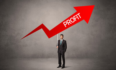 Fototapeta premium Young business person in casual holding road sign