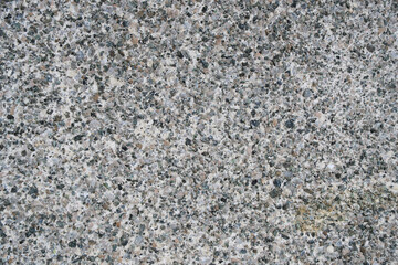Abstract background, concrete wall with granite chips.