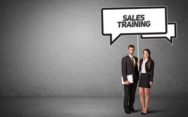 Obraz premium business person in casual holding road sign