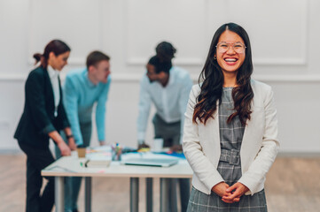 Portrait of a an asian businesswoman posing during a meeting in the office