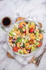 Avocado shrimp salad with cherry tomatoes