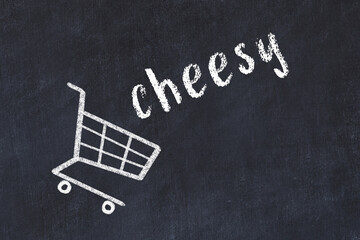 Chalk drawing of shopping cart and word cheesy on black chalboard. Concept of globalization and...