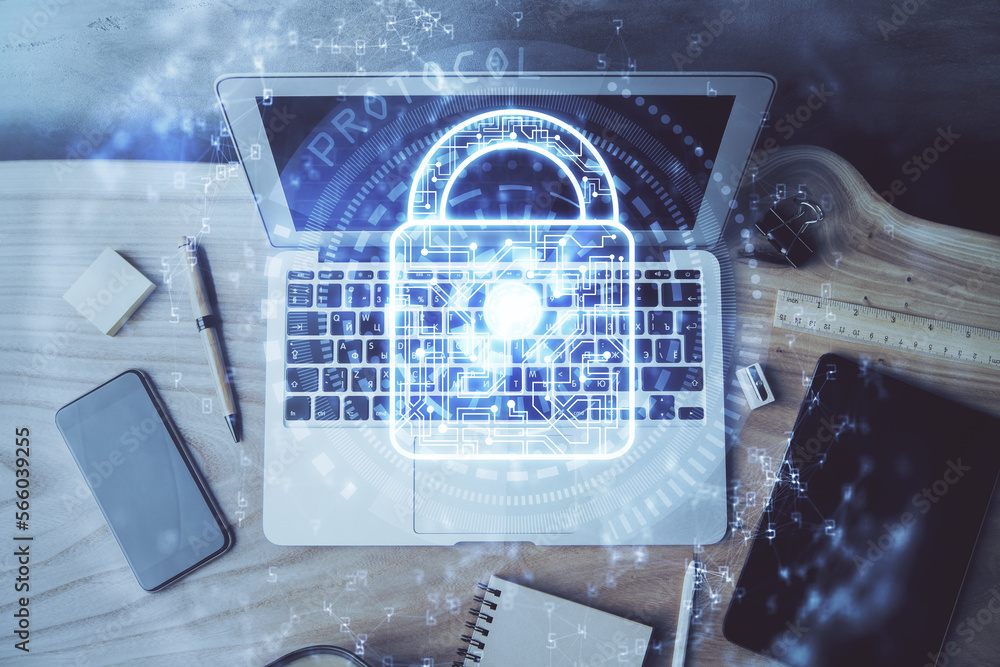 Fototapete double exposure of desktop with computer and lock icon hologram. concept of data safety.