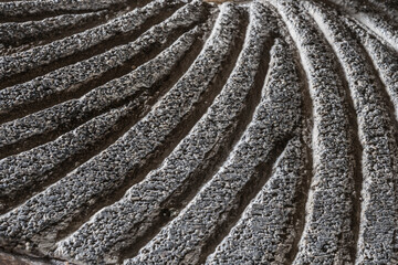 grooves of a historic milling stone