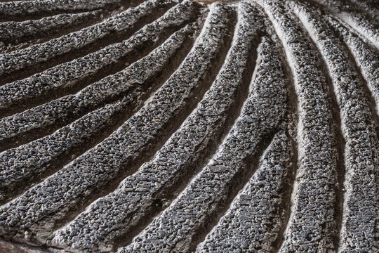 grooves of a historic milling stone