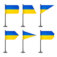 Realistic various Ukrainian table flags on a black steel pole. Souvenir from Ukraine. Desk flag made of paper or fabric, shiny metal stand. Mockup for promotion and advertising. Vector illustration
