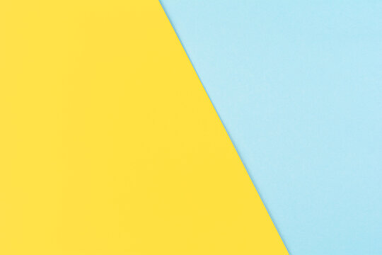 Yellow and pastel blue paper abstract background