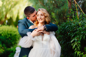 beautiful and loving bride and groom hugging. 