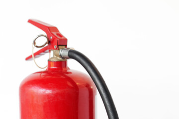 Fire extinguisher used to put out fires during an emergency, on an isolated white background, close-up