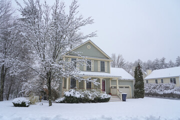 houses in residential community after snow in winter 