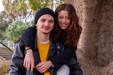 Beautiful young couple in love dating outdoors 