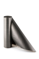 Roll of black plastic garbage bags isolated on white background. Full depth of field. Close-up