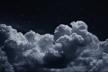 Black dark blue night sky with stars. White cumulus clouds. Moonlight, starlight. Background for...