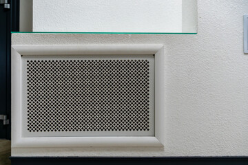 Radiator grille of a large industrial air purifier. Indoor air purification and filtration system....
