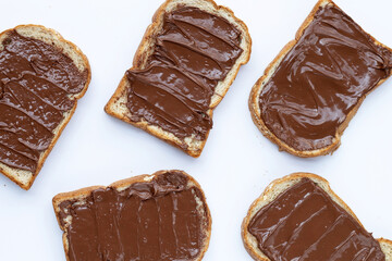 Bread with sweet chocolate hazelnut on white