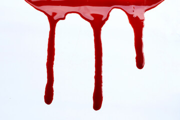 Drops of blood on white background.