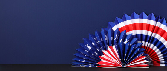 American folding paper fans on dark blue background. Banner design for USA national holidays like...