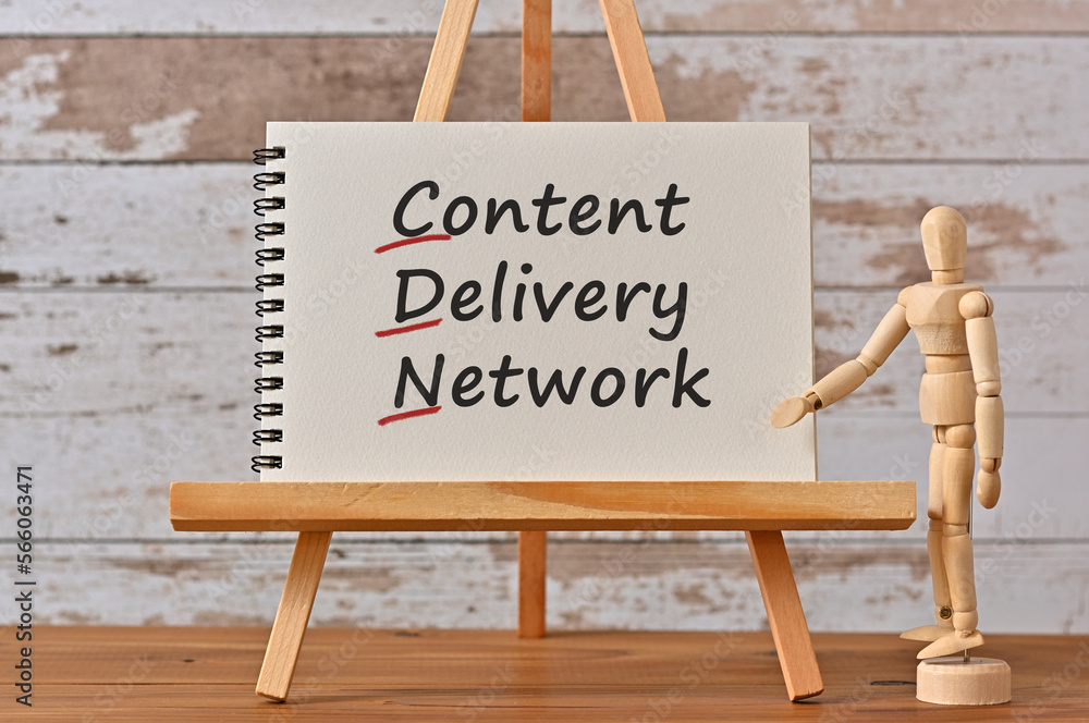 Poster there is notebook with the word content delivery network. it is an eye-catching image.