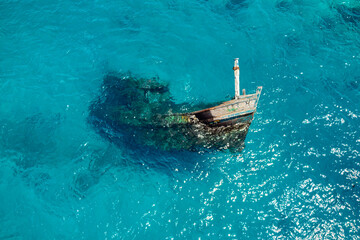 Aerial view of a sunken ship near Keyodhoo, Vaavu Atoll, Maldives, Indian Ocean. A place for...