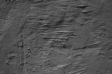 gray wall close-up, in the photo the wall is covered with gray plaster
