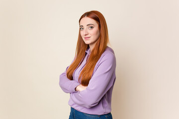 Fototapeta premium Young red hair woman isolated happy, smiling and cheerful.