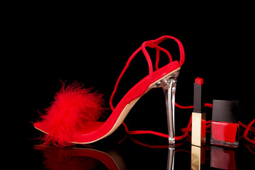   sexy, red strappy high heel shoes with box on a black background