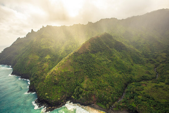 Ocean mist and clouds sit in the mountains of Kauai, Hawaii.