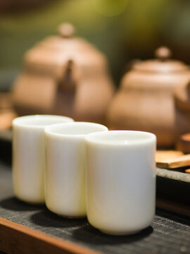 Tea cups and tea kettles in use inside a specialty Tea shop in Taipei, Taiwan