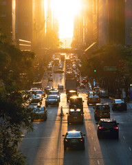 View of evening rush hour traffic traveling crosstown on 42nd Street through Manhattan New York...