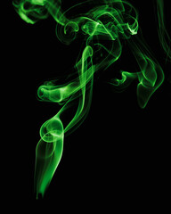 Green smoke on a black background