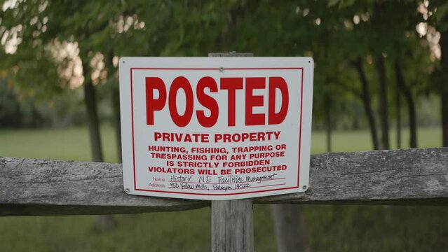 No Trespassing sign posted on a fence  near the Joseph Smith family farm, frame house, temple, visitors center, sacred grove in Palmyra New York  for the Mormons and the book of Mormon.