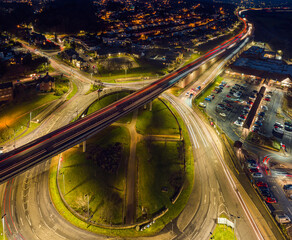 Fototapeta na wymiar Night Top Down over Penn Inn Flyover and Roundabout from a drone Newton Abbot, Devon, England