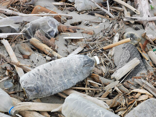 Environment concept. Plastic waste and garbage, pollution on the beach.