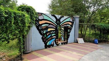 Vandalur,Tamilnadu,India-October 04 2022: Entrance of Beautiful butterfly park of Arignar Anna Zoological Park, AAZP - obrazy, fototapety, plakaty