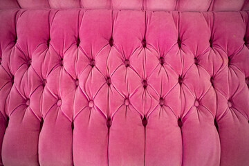 bright pink velvet sofa texture with button tufts