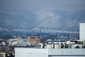 ドローンで空撮した冬の長野県松本市の街風景