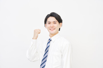 ガッツポーズするビジネスマン　白背景