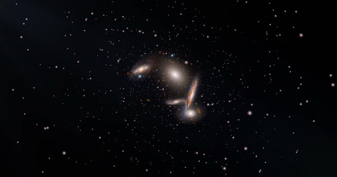 Wide field video of Hickson compact group 40. Fly towards extremely distant galaxies revealing the view of the Hickson compact group 40. Contains elements by Nasa.