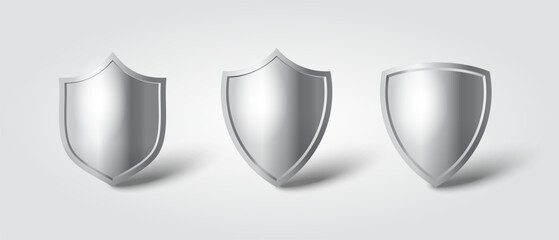 Shiny metal shield vector set isolated. Shield template. Symbol of protection and security.