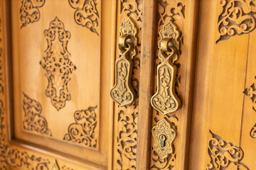 Antique oriental style doors with large handles