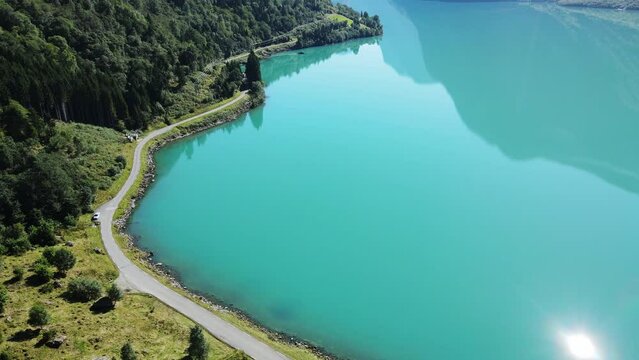 Lovatnet glacier lake and Breng seter historical farm houses. Drone footage. Norway