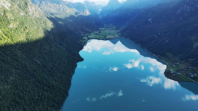 Beautiful Oldevatnet glacier lake in Norway and famous Briksdalsbreen glacier. Drone footage
