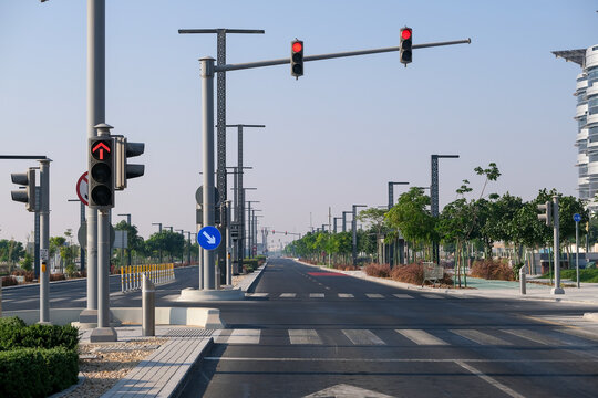 Empty Highway, Roadway With Road Sign Obstacle Detour Right   And Traffic Lights With Red Light