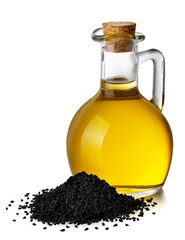 black cumin oil in glass bottle and heap of seeds isolated on white