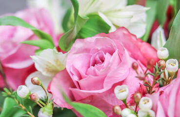 Pink rose in flower arrangement. Decoration roses and ornamental plants