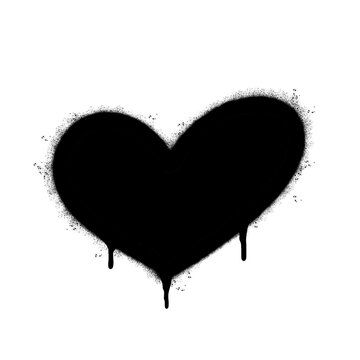 Spray Painted Graffiti heart icon Sprayed isolated with a white background. graffiti love icon with over spray in black over white.