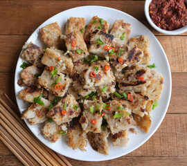 A must have dish for Cantonese celebrating Chinese New Year. Homemade Fried Radish Cake aka Lo Bak Go. Delicious and healthy, a dish that brings good fortune synonym with Chinese beliefs