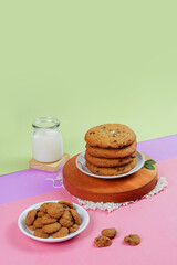 chocolate cookies or snacks with milk chocolate ingredients in a photo with a full color minimalist concept