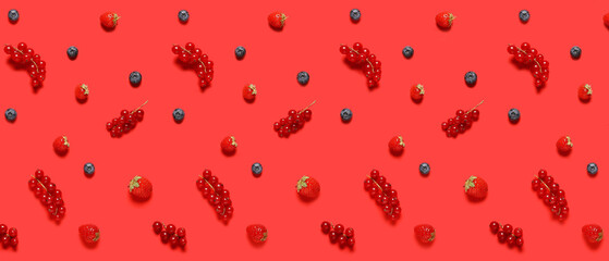 Different ripe berries on red background. Pattern for design