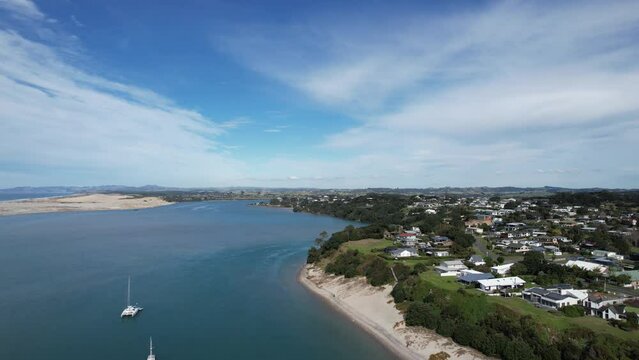 An aerial drone view of Mangahwai harbor in New Zealand.
